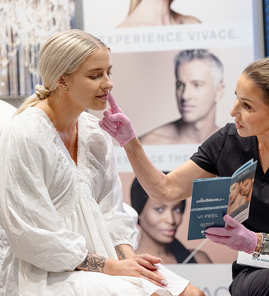 Skincare consultation at a beauty event.