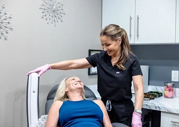 Beauty treatment between client and expert.